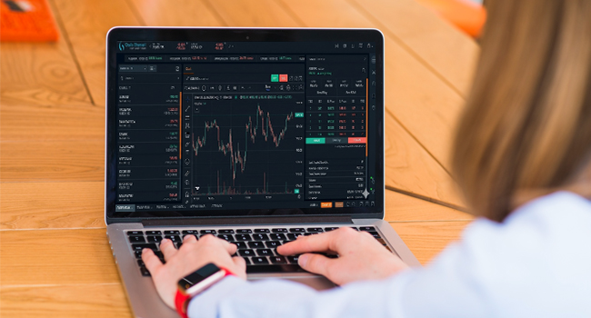 Online trading platform displaying live stock prices, charts, and buy/sell options for active traders.